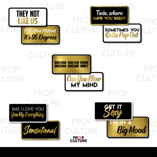 Set of black and gold double-sided photo booth props with popular music and pop culture phrases including “They Not Like Us,” “It’s 95 Degrees,” “Big Mood,” and more.